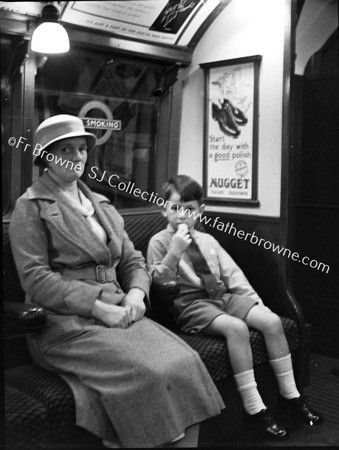 PASSENGERS IN TUBE  PICADILLY LINE